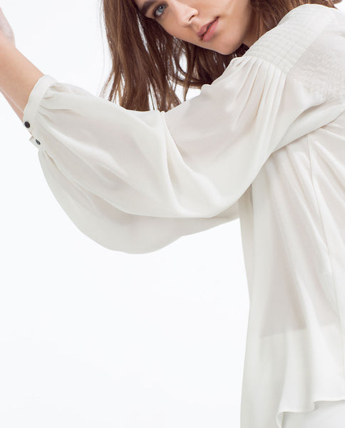 PLEATED SLEEVE BLOUSE